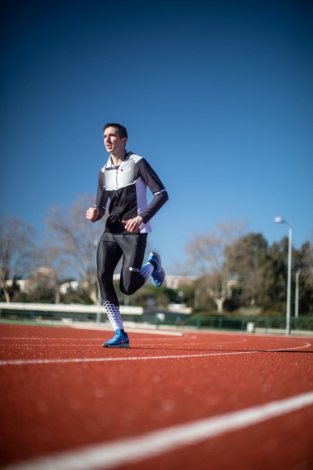 Veste course à sales pied